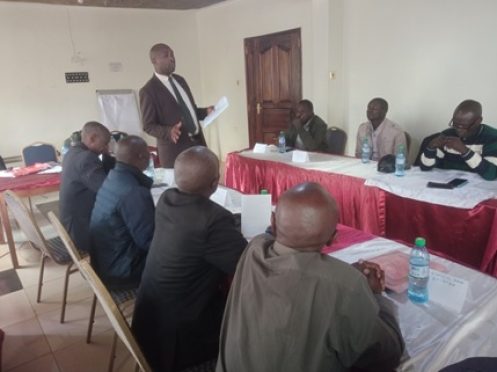 The Project leader Mr. Cylock Bogonko Teaching the PTA Members on Child participation rights and guidelines in decision making at Borabu County Inn in Nyamira County.